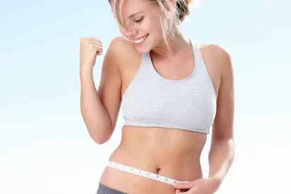 woman happy after fat reduction treatment Ashbourne
