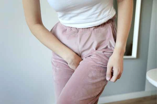 older woman running to the toilet because of urinary incontinence Ashbourne