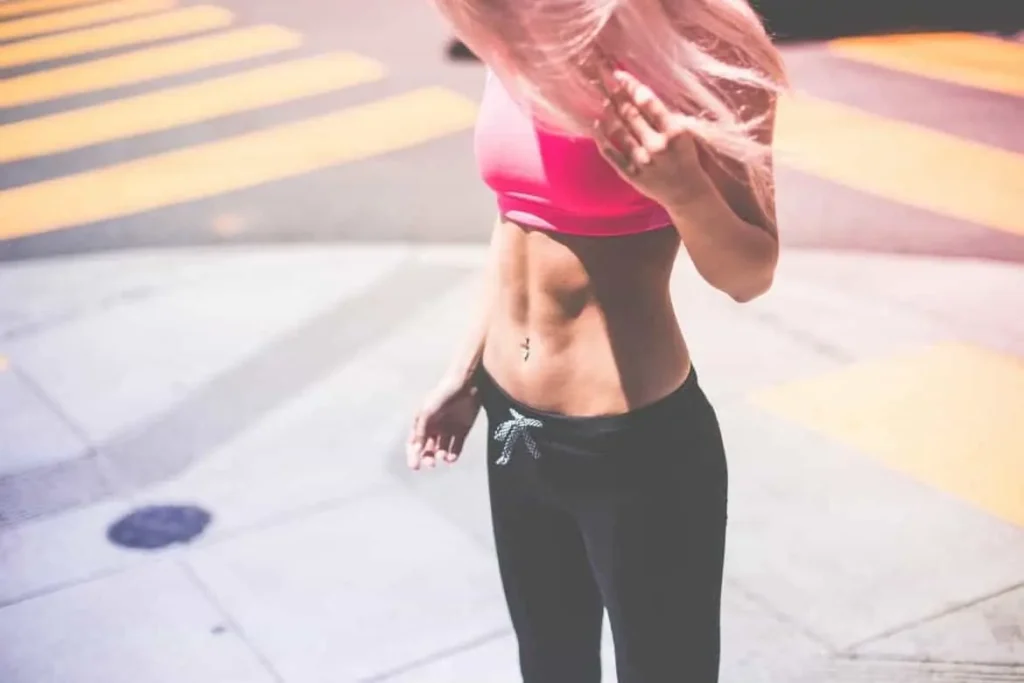 Woman with toned stomach after LA-EMS Body Sculpting Treatment Ashbourne